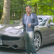 (Screenshot from our Jason Drives episode featuring the Karma back when it was a ‘Fisker’. Not much has changed, including the expression.)